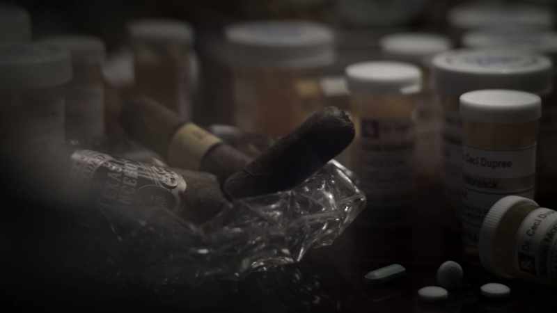 On Simon's side of the nightstand