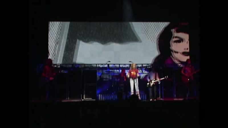 On stage the screen is overpowering us