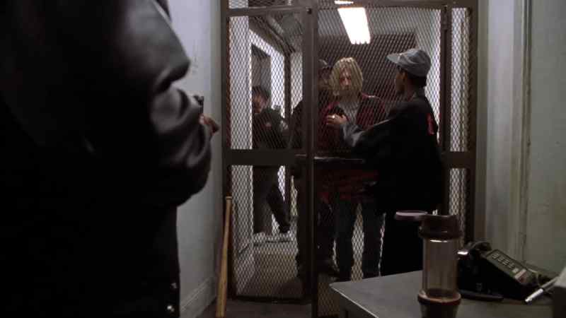 On the 2nd floor, a worker rings a buzzer and a code
