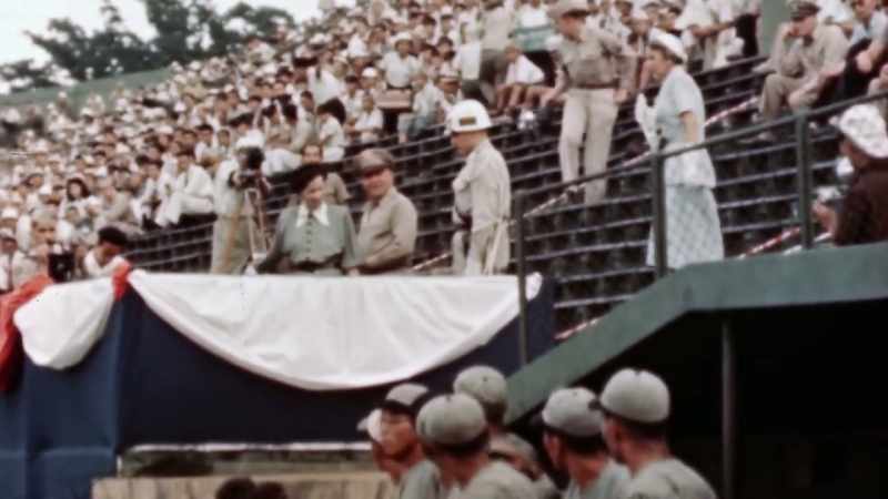 ONCE, SHE EVEN THROWS OUT THE FIRST PITCH