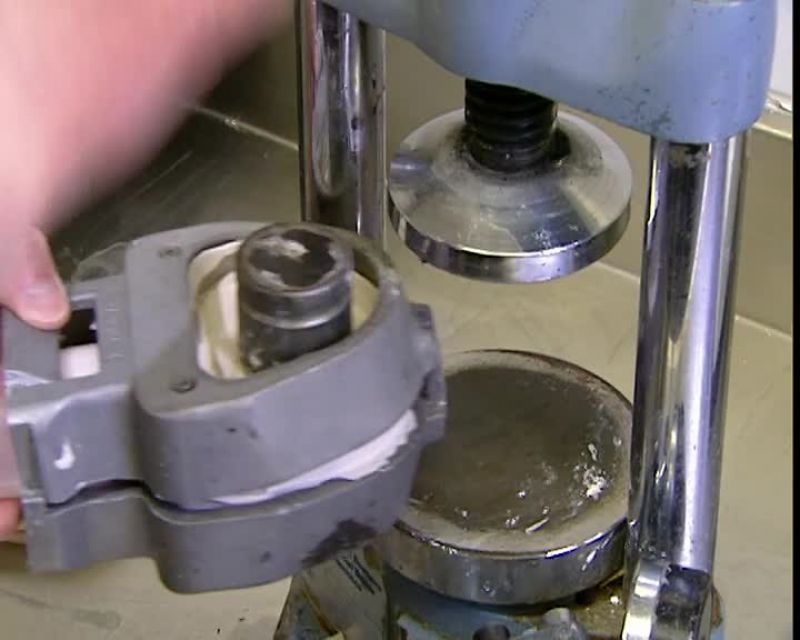 ONCE THE FLASK HAS COOLED DOWN, THEY BREAK THE PLASTER