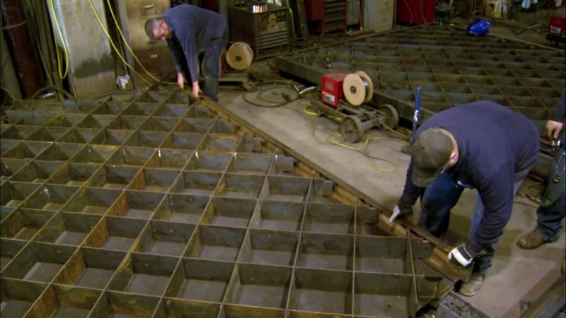 ONCE THEY'VE INSTALLED FRAMING ON ALL FOUR SIDES