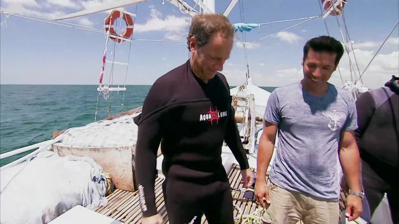 ONCE TROY'S BACK IN THE WATER, IT TAKES ABOUT THREE SECONDS