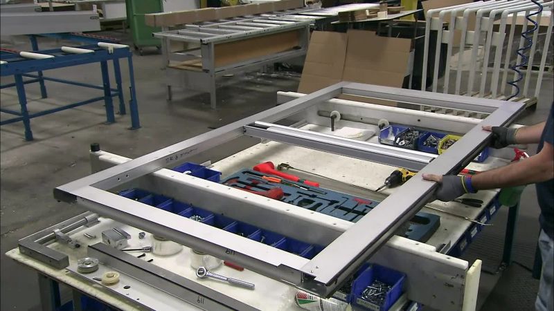 ONCE WORKERS HAVE ASSEMBLED THE TWO DOOR STRUCTURES
