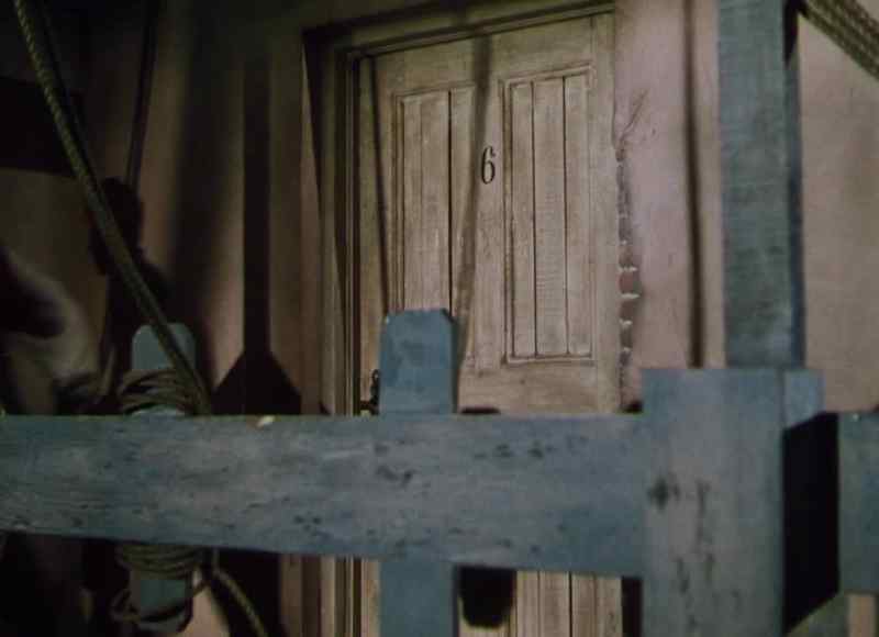 Open that door! Let me out of here!