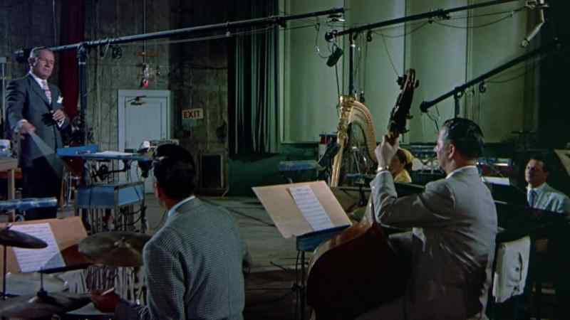 (ORCHESTRA PLAYING IT LOOKS LIKE LOVE)