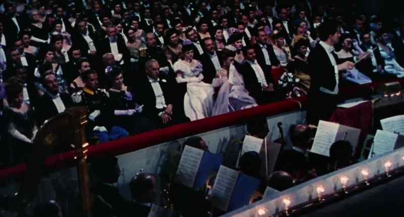 (orchestra plays)