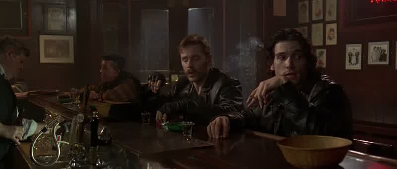 Order those two men some drinks and put it on my tab