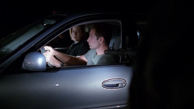 Out of the car! - (gun cocks)