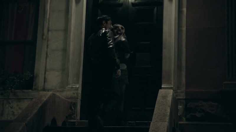 outside her residence with him