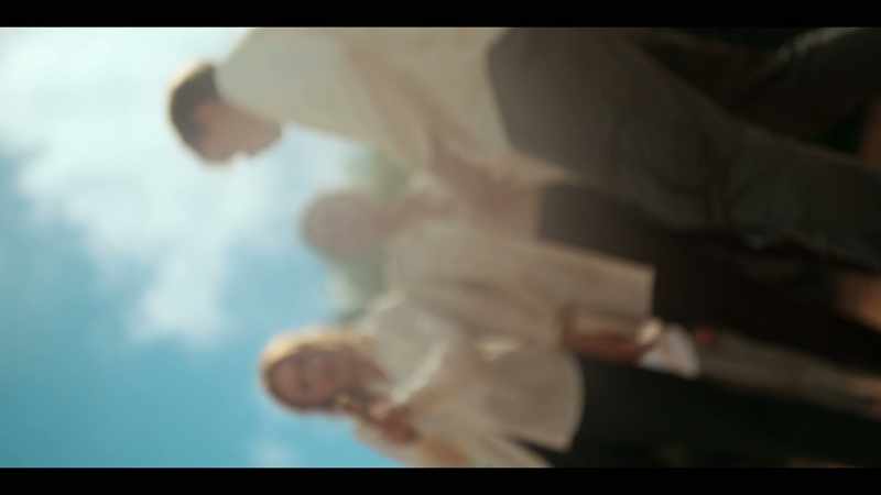 [overlapping distorted voices]