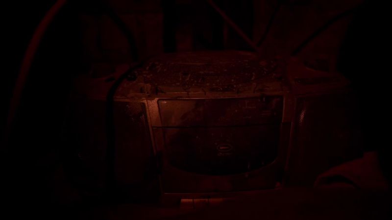 [padlock bumps against metal plate]