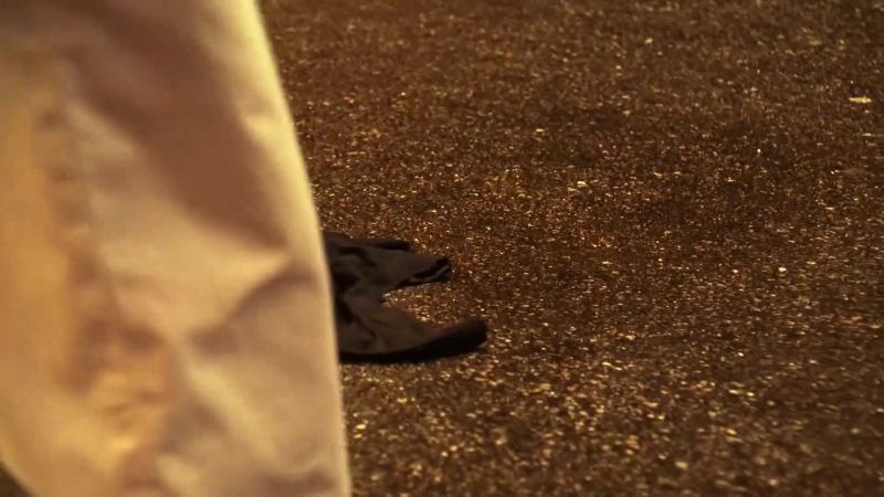 Paramedics cut our victim's shirt off