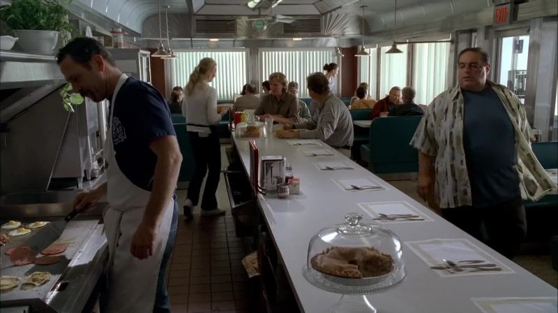 (PATRONS CONVERSING) - (DISHES CLANGING)