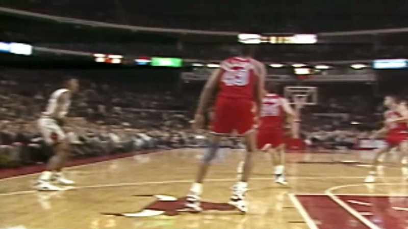 Paxson looks down the floor. Got Kerr and Pippen baseline