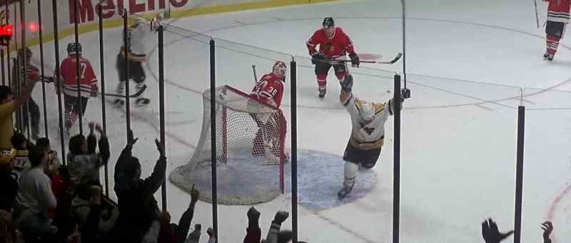 Penguins slip it back behind the Chicago goal