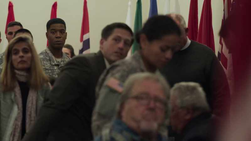 (people standing)