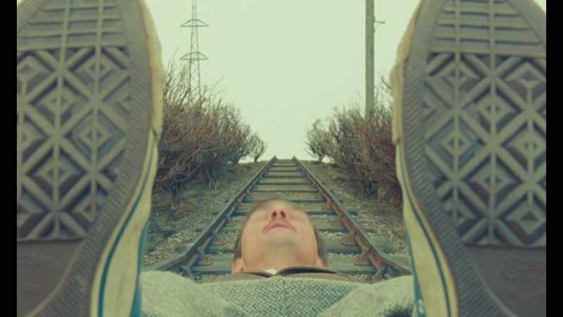Peter raised his head and looked down the railway line