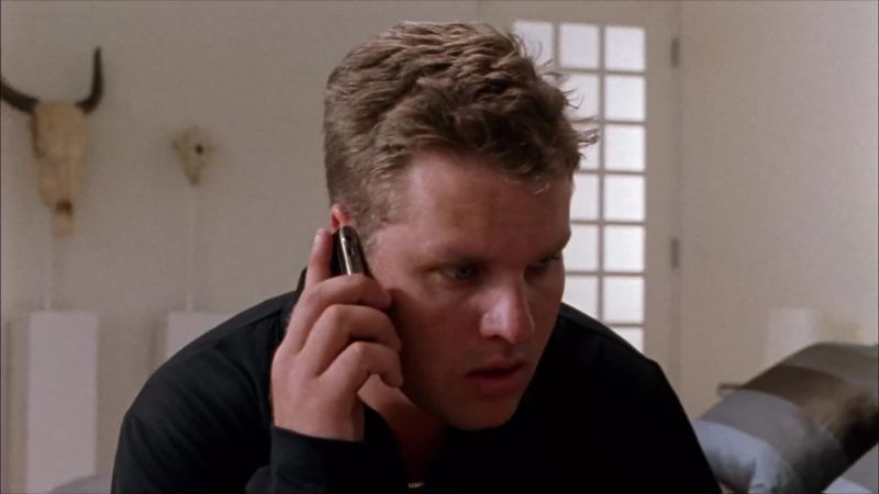 [ Phone Beeps ]