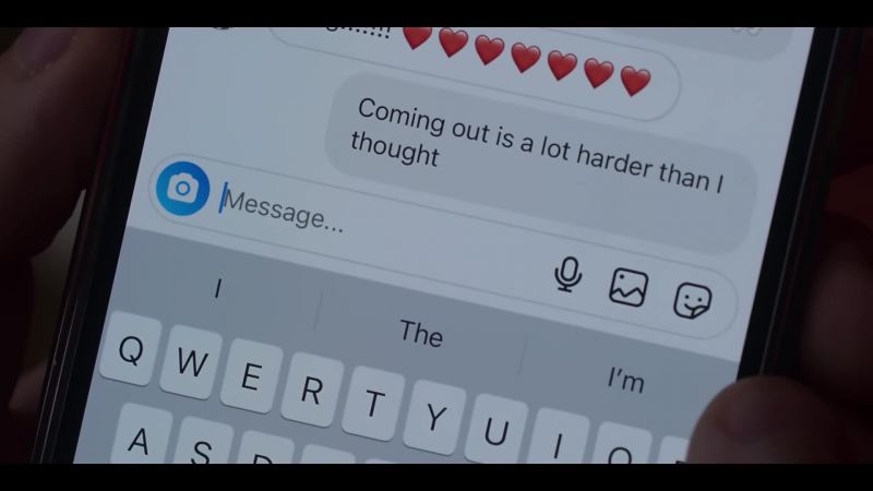 [phone buzzes]