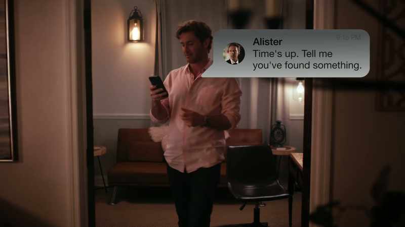 [phone buzzing]