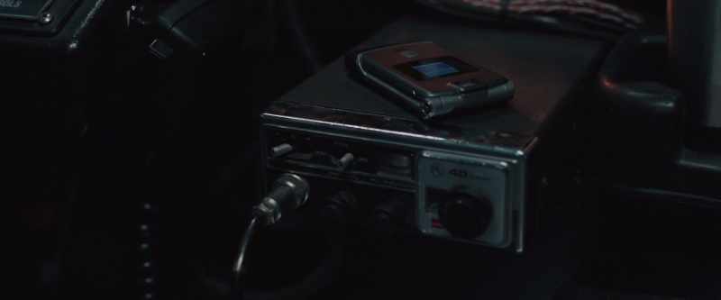 [phone buzzing]