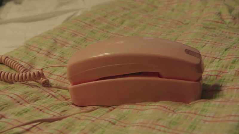[phone ringing]