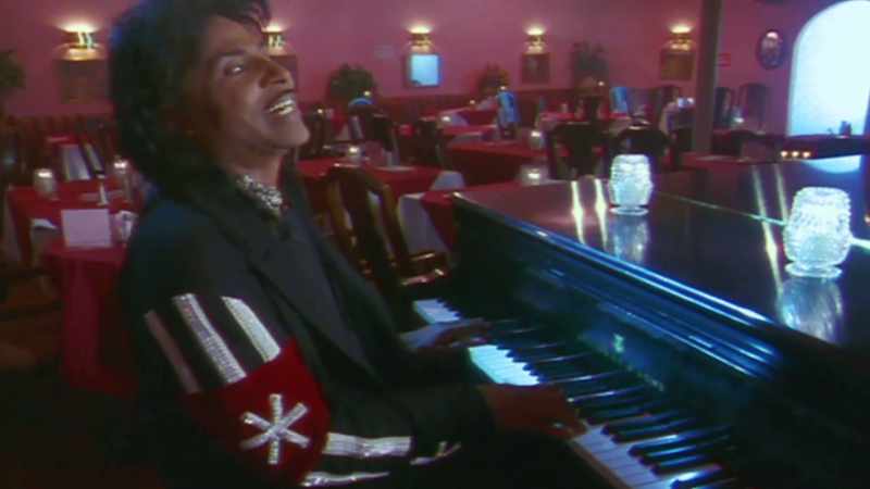 [piano plays]