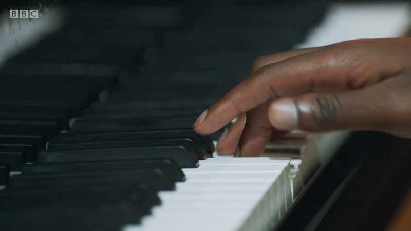 PIANO TINKLES SOFTLY