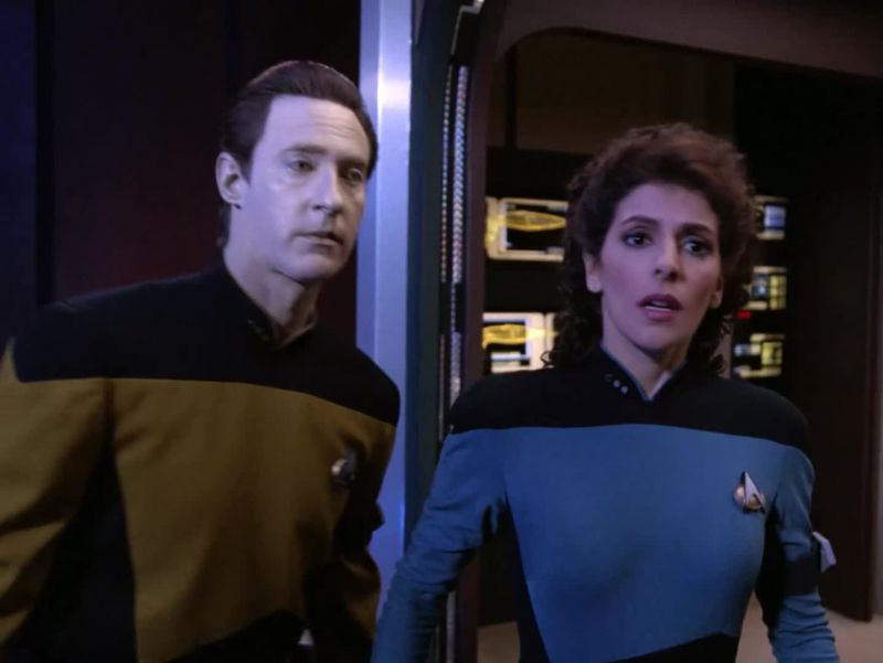 [PICARD GRUNTS THEN TROI GASPS]