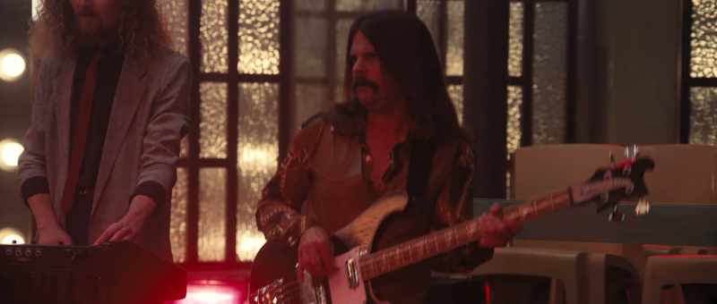 (PLAYING BASS RIFF)