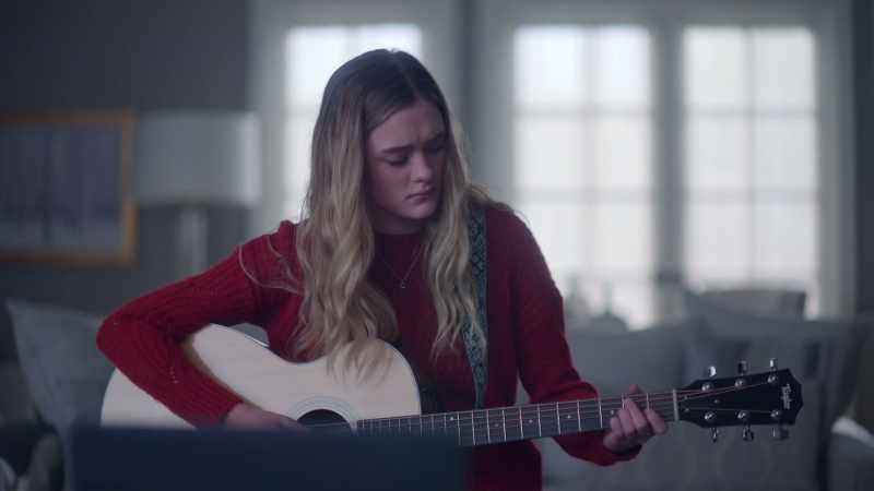 [PLAYING GUITAR]