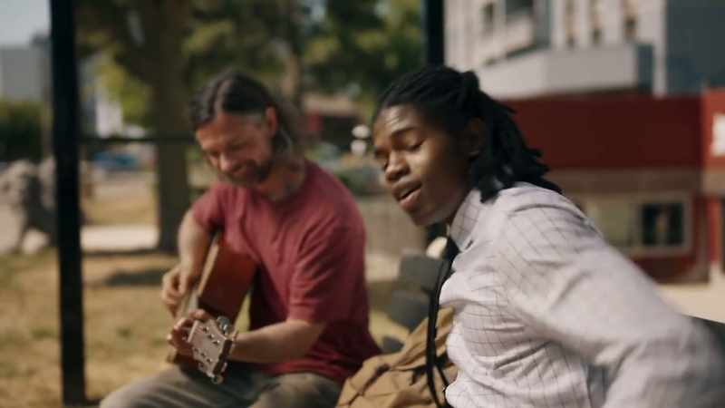 (playing guitar)