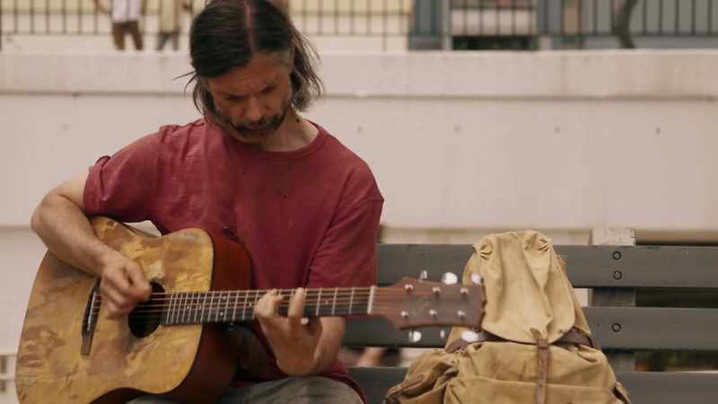 (playing guitar)