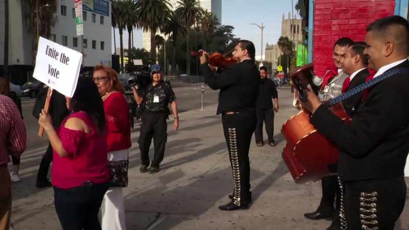 (playing mariachi music)