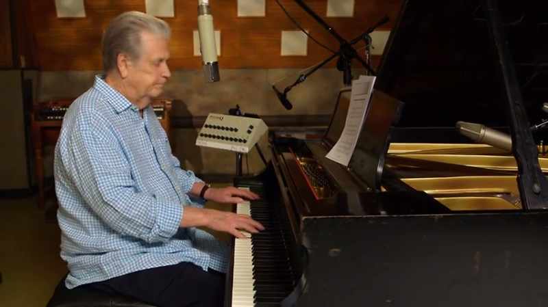 [PLAYING PIANO]