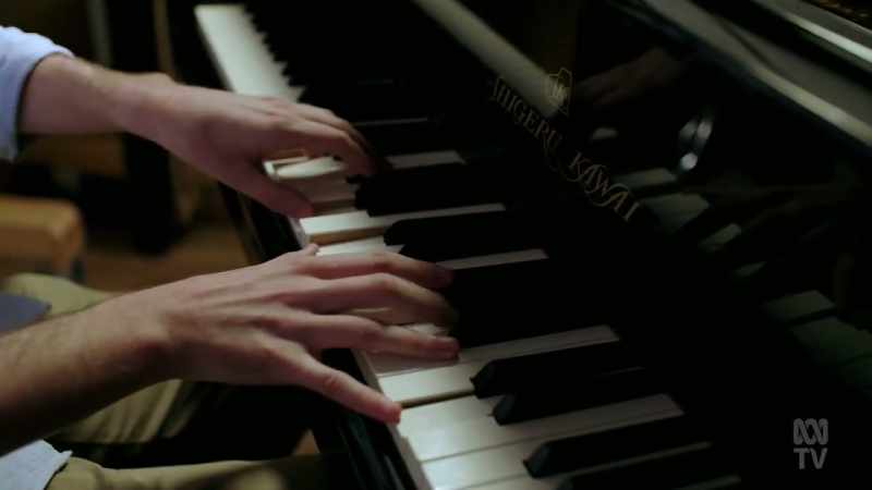 (PLAYS CLASSICAL PIECE)