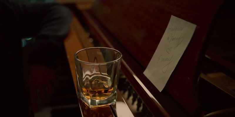 (PLAYS REPEATED NOTE ON THE PIANO)