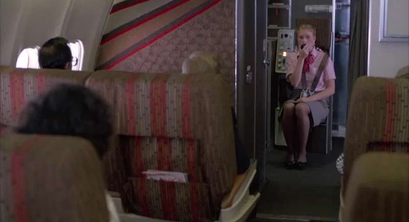 Please remain in your seats until we reach the terminal