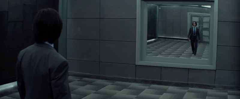 Please stand facing the mirror before the white line