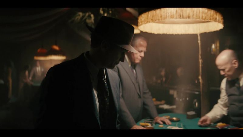 (POKER CHIPS CLATTERING)
