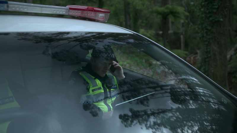 POLICE OFFICER (over phone): And... (sighs)