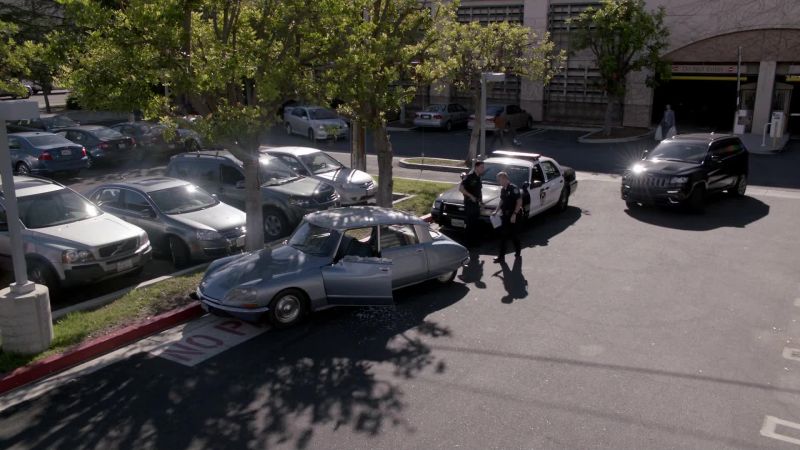 (Police radio chatter)