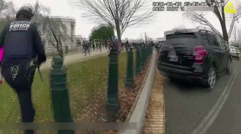(police radio chatter)