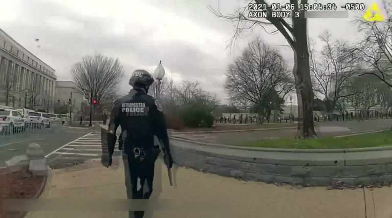 (police radio chatter)