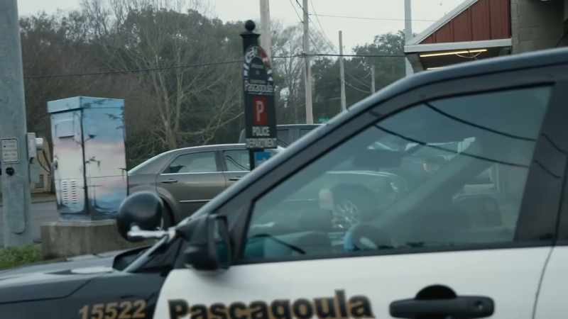 [police radio chatter]