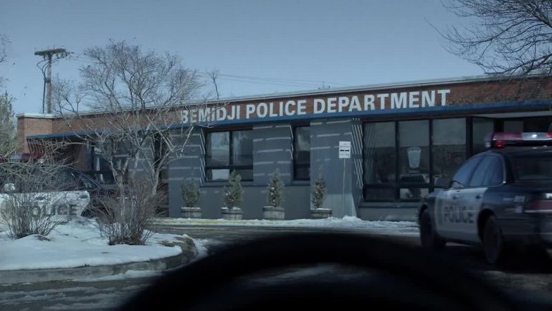 [police radio chatter]