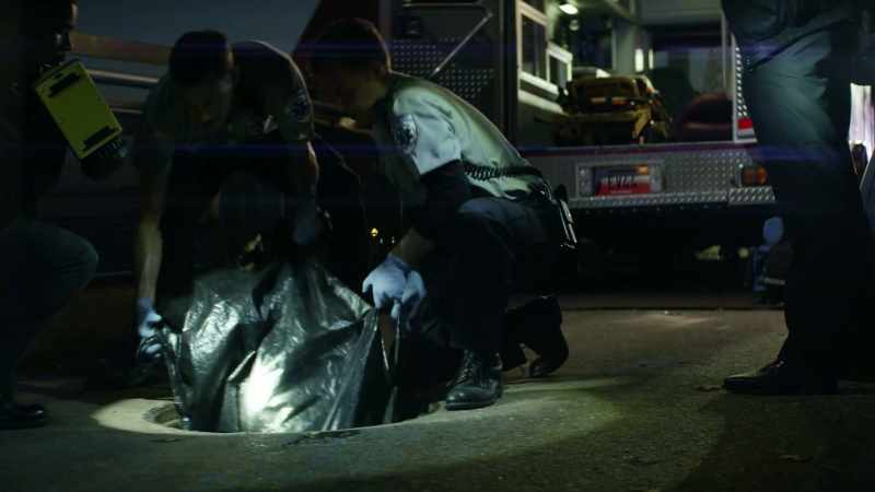 (police radio chatter)