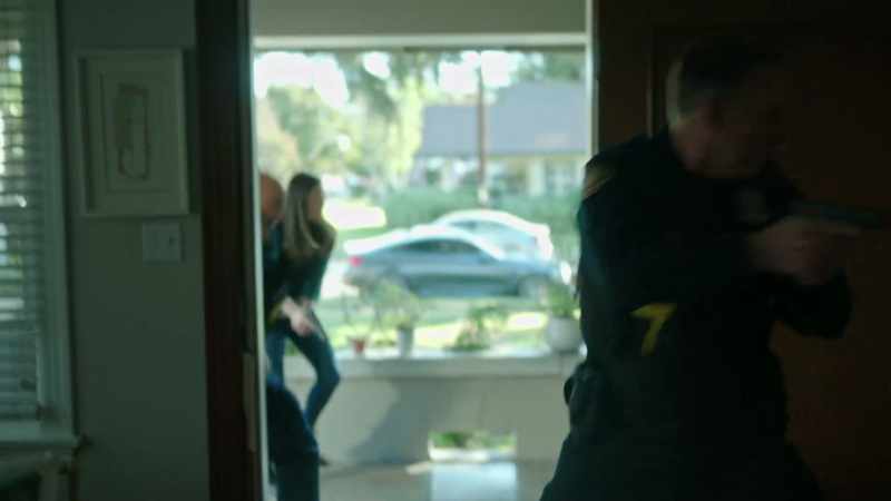 [ Police radio chatter ]