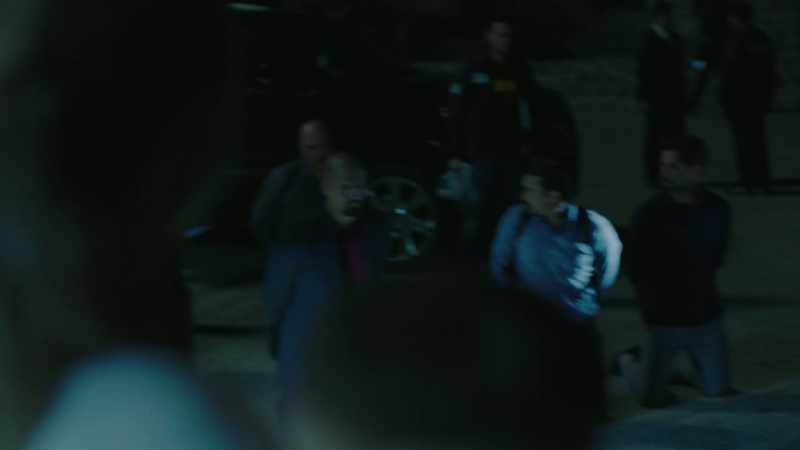 (police radio chatter)